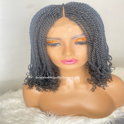 Kay-Ann shoulder twist wig with curly with a bun