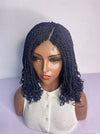 Kay-Ann shoulder twist wig with curly with a bun