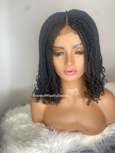 Kay-Ann shoulder twist wig with curly with a bun